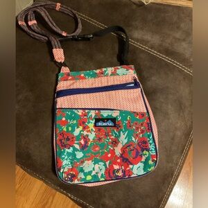 KAVU Keeper Crossbody Bag In a Floral and Herringbone Pattern